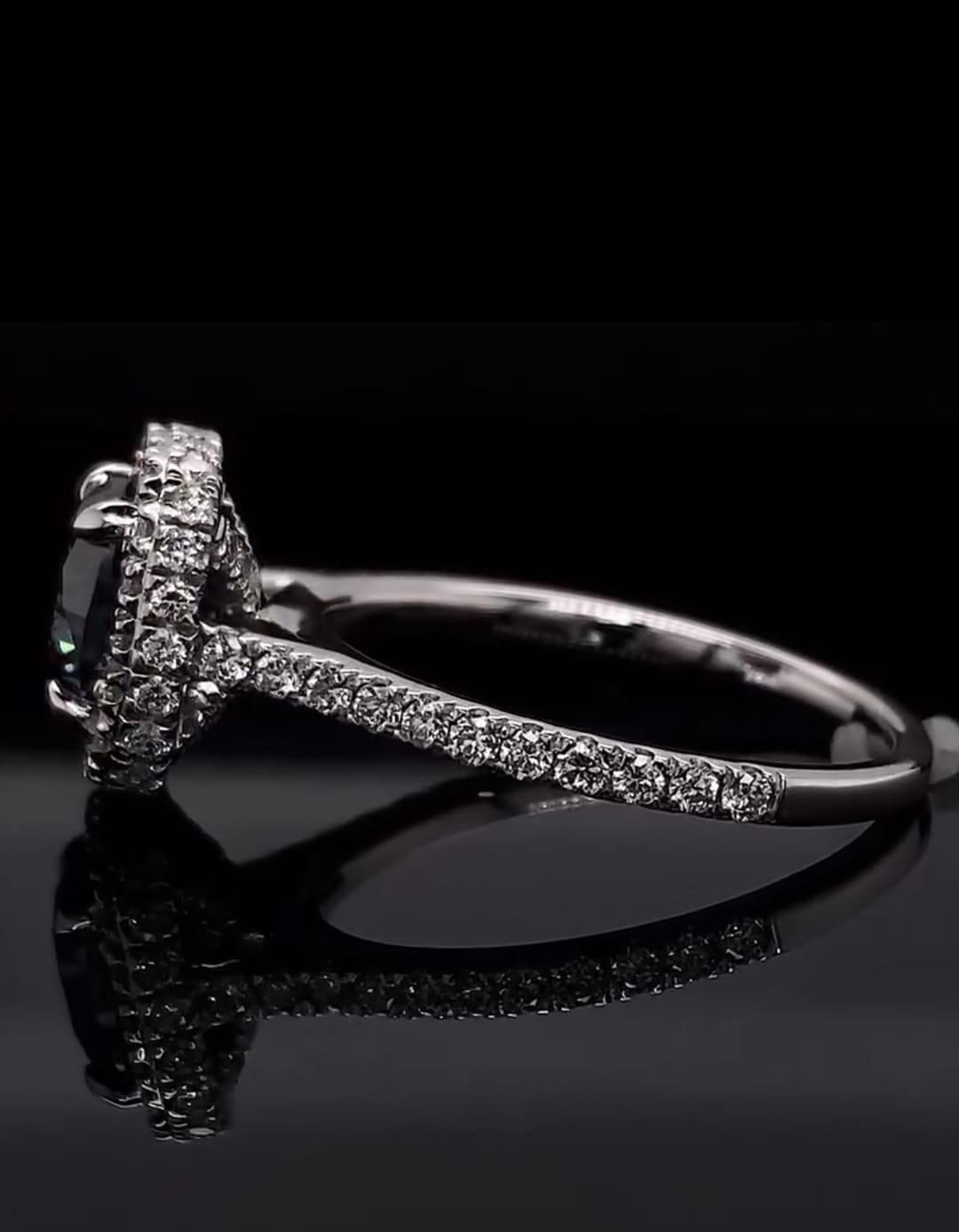 Detailed view of the sparkling diamond pave band on the grey moissanite ring.