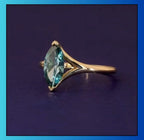 side-profile-of-green-marquise-moissanite-ring-with-split-shank