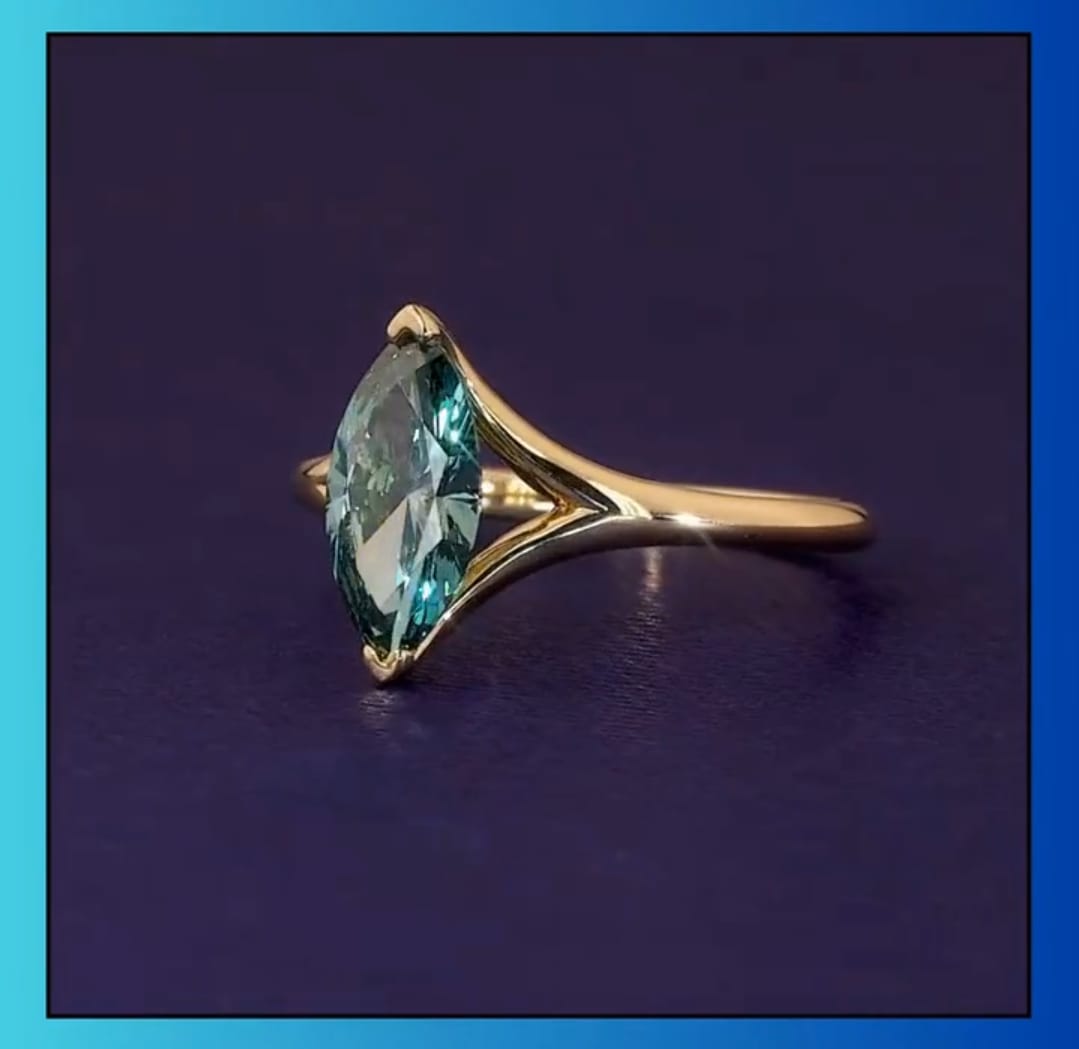 side-profile-of-green-marquise-moissanite-ring-with-split-shank