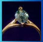 front-prong-detail-of-3-carat-green-marquise-gemstone-ring