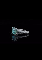 side-angle-view-of-4-ct-green-cushion-cut-moissanite-ring-with-pave-band