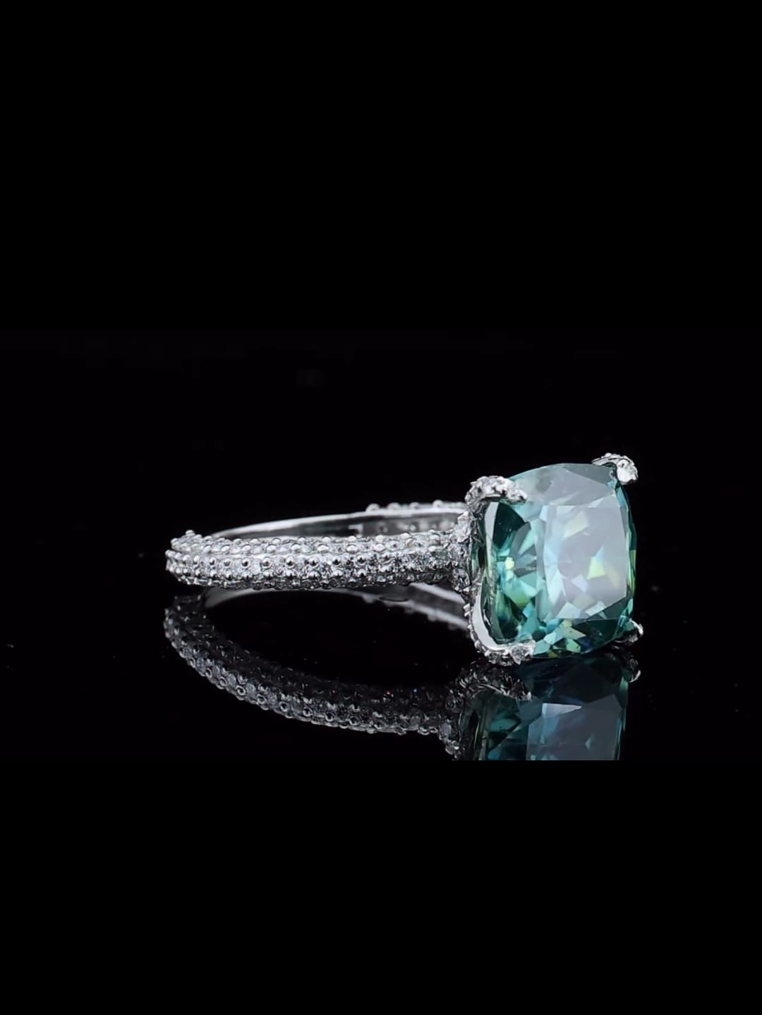 side-profile-highlighting-sparkling-pave-detailing-on-moissanite-engagement-ring