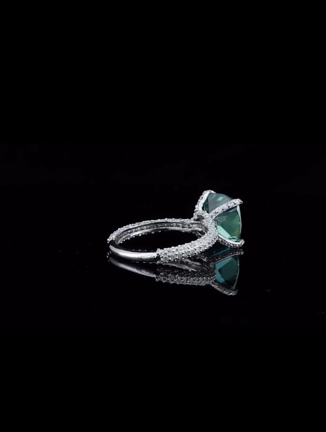 elegant-angled-view-of-luxury-green-cushion-moissanite-bridal-ring