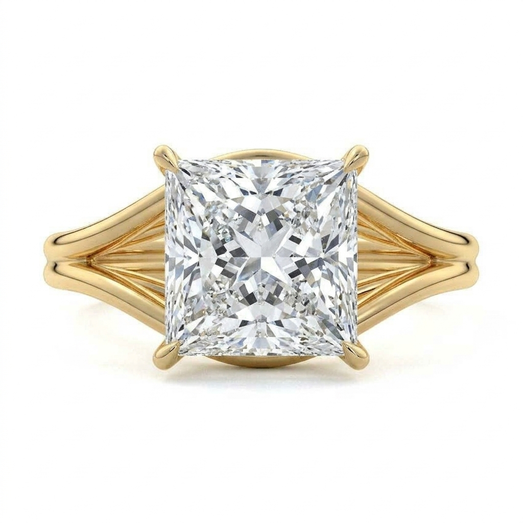 Top-down view of a 3 CT princess cut lab grown diamond ring with open split shank band in yellow gold.