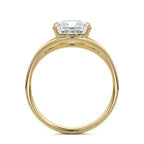 Direct side profile view of a 3 carat princess cut lab diamond split shank solitaire ring in yellow gold.