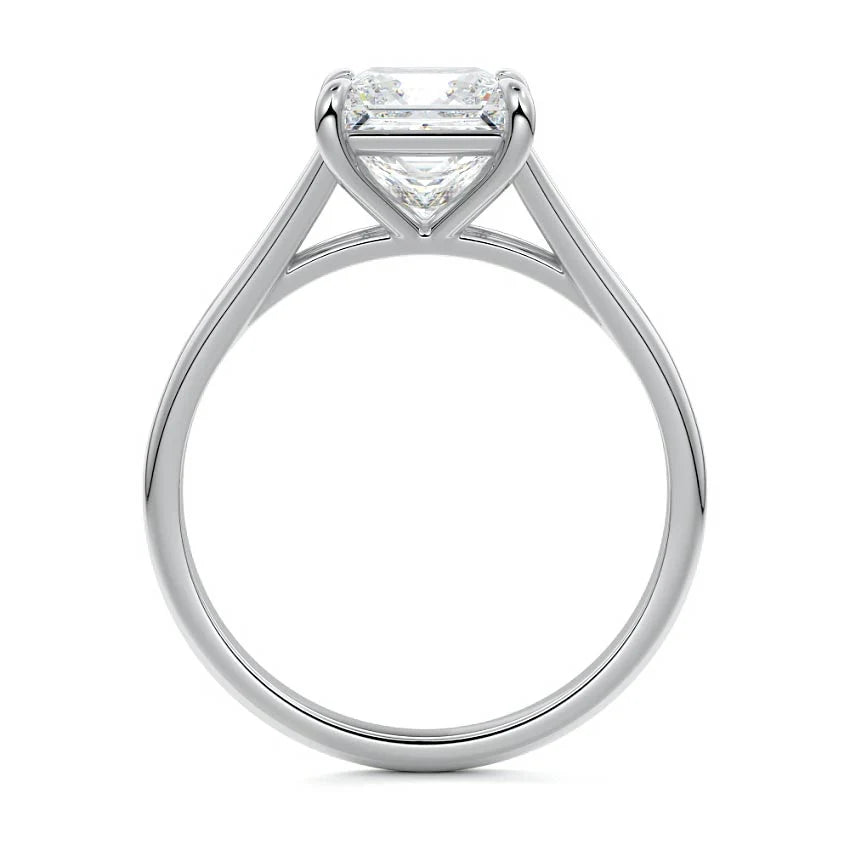 Direct side profile view of a 2 carat princess cut lab diamond ring with cathedral split shank setting in white gold.