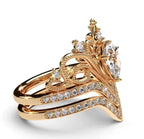 Left side profile view of the yellow gold 2 CT crown tiara diamond ring set showing filigree scrollwork and chevron pavé band.