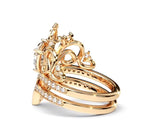 Rear side view revealing the stacked ring profile, polished bottom shank, and crown peak structure.