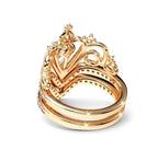 Top-back perspective showing the stacked gold bands, inner ring construction, and tiara peak contour.