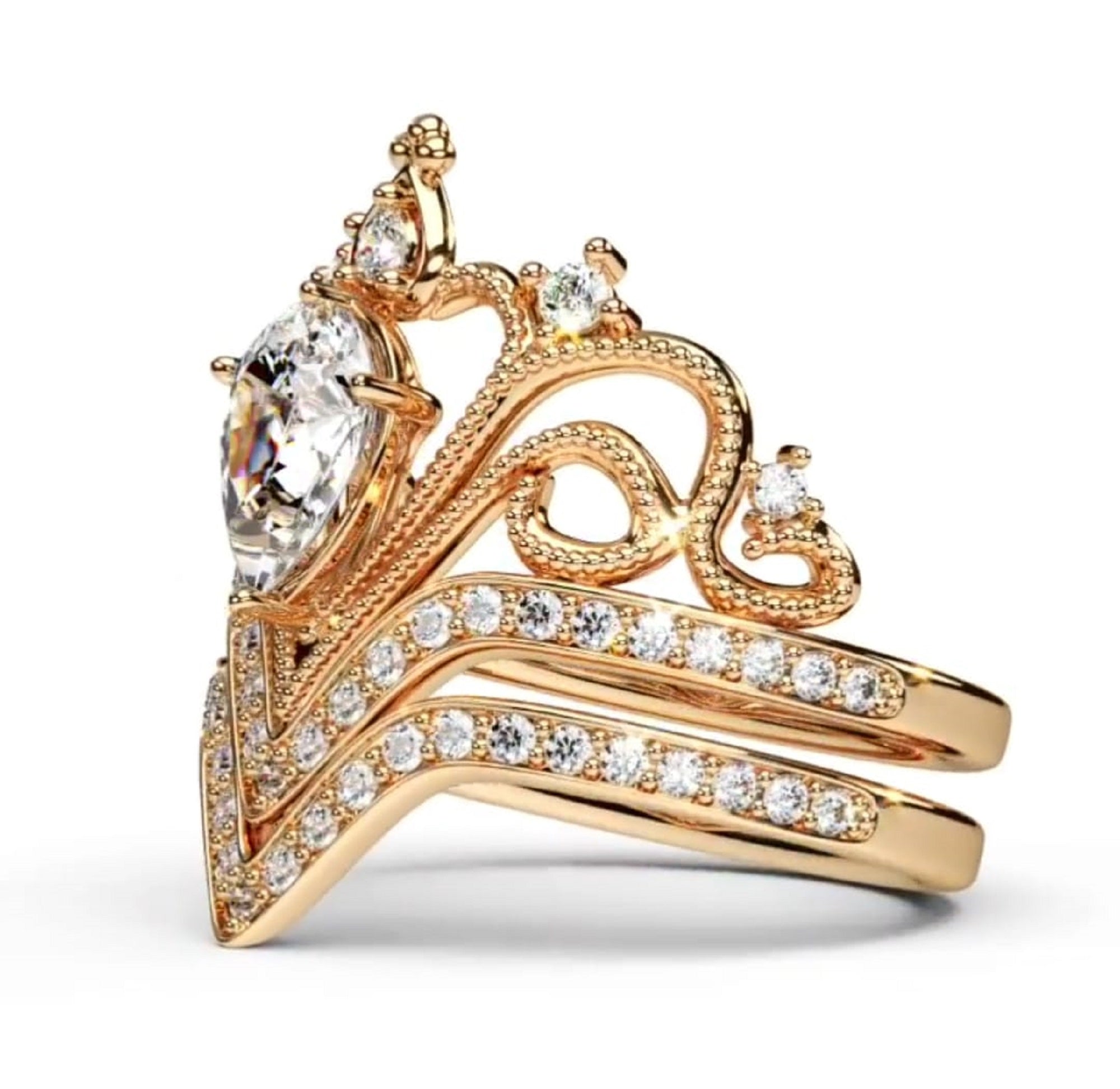 High-angle profile shot displaying the intricate gold scroll detailing, diamond setting, and stacked band fit.