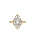 Direct top-down view of a 4 CT marquise cut lab grown diamond solitaire engagement ring on a plain yellow gold band.