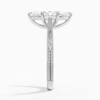Side profile view of a 3 CT marquise cut lab diamond ring with carved scrollwork and milgrain borders in white gold.