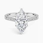 Direct top-down view of a 3 CT marquise cut lab grown diamond engagement ring with vintage carved shoulders in white gold.