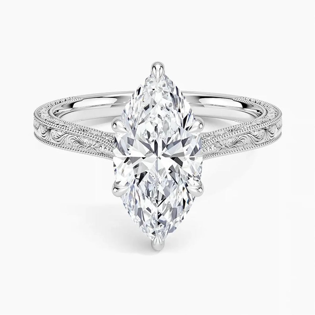 Direct top-down view of a 3 CT marquise cut lab grown diamond engagement ring with vintage carved shoulders in white gold.