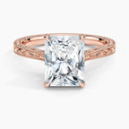 Direct top-down view of a 3 CT radiant cut lab grown diamond solitaire ring on an engraved rose gold band.