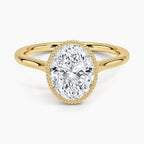 Top perspective view displaying a 3 CT oval cut lab diamond engagement ring in yellow gold.