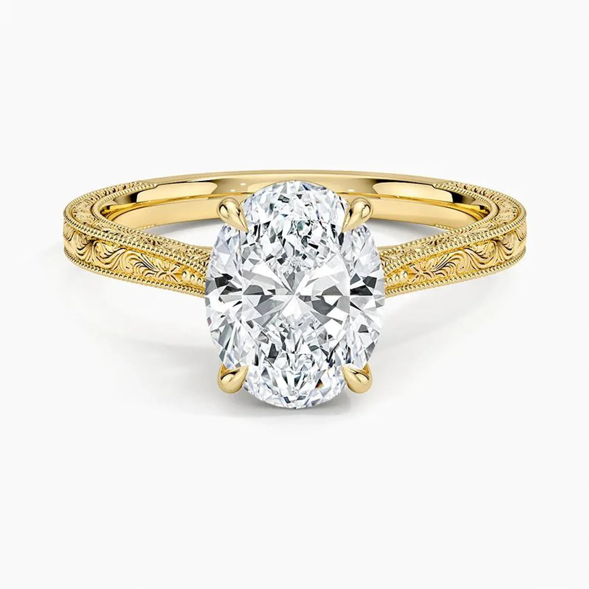 Direct top perspective view of a 3 CT oval cut lab grown diamond engagement ring on an engraved yellow gold band.   