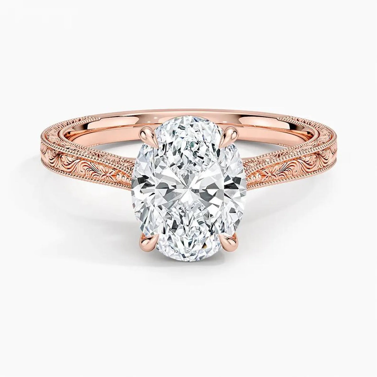 Direct top perspective view of a 3 CT oval cut lab grown diamond solitaire ring on an engraved rose gold band.