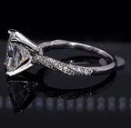 Detailed side view illustrating the twisted band profile and polished lower shank of the 3 CT radiant solitaire ring.