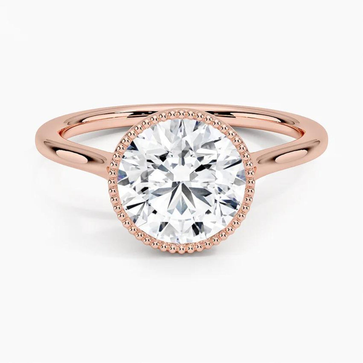 Top-down view showcasing a 3 CT round brilliant lab grown diamond in a rose gold milgrain bezel setting.