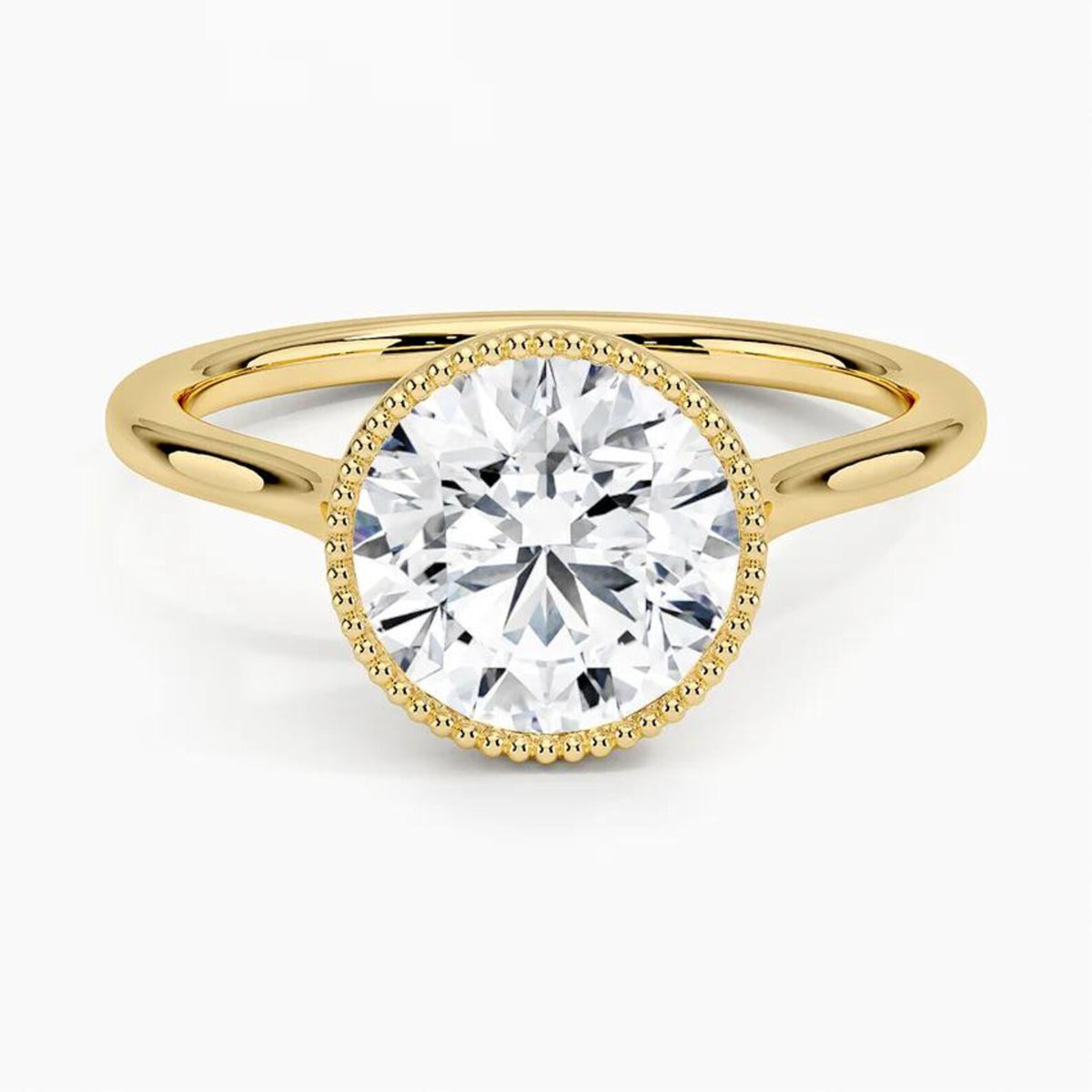 Top-down view of a yellow gold engagement ring featuring a 3 CT round brilliant lab diamond surrounded by a milgrain rim