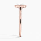 Direct side profile view of a 3 CT round lab diamond engagement ring in polished rose gold.