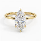 Direct top-down view of a 4 CT marquise cut lab grown diamond solitaire ring with 6 claw prongs on a yellow gold band.