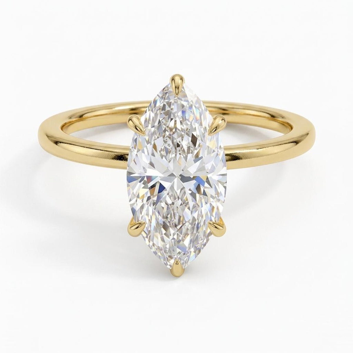 Direct top-down view of a 4 CT marquise cut lab grown diamond solitaire ring with 6 claw prongs on a yellow gold band.