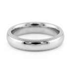 Studio product shot of a men's platinum milgrain edge wedding ring isolated on a clean white background