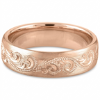 Front view of a men's rose gold wedding band featuring an intricately engraved scroll pattern on a brushed surface