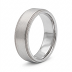 Studio shot of a men's white gold flat wedding ring featuring a brushed surface and textured borders.