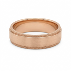 Front view of a men's rose gold textured wedding ring showing satin finish and knurled borders