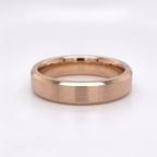 Front studio view of a men's rose gold wedding band showing satin top finish and chamfered edges.
