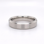 Front horizontal shot of a men's white gold wedding ring with satin center and beveled edges