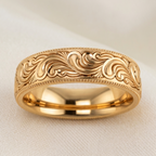 Front studio view of a men's yellow gold vintage engraved ring with filigree detail.