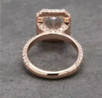 Under-gallery rear shot revealing the open setting basket design and smooth rose gold bottom band.