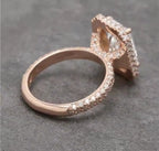 Side profile view emphasizing the thick multi-row micro-pavé diamond band extending down the rose gold ring shank.