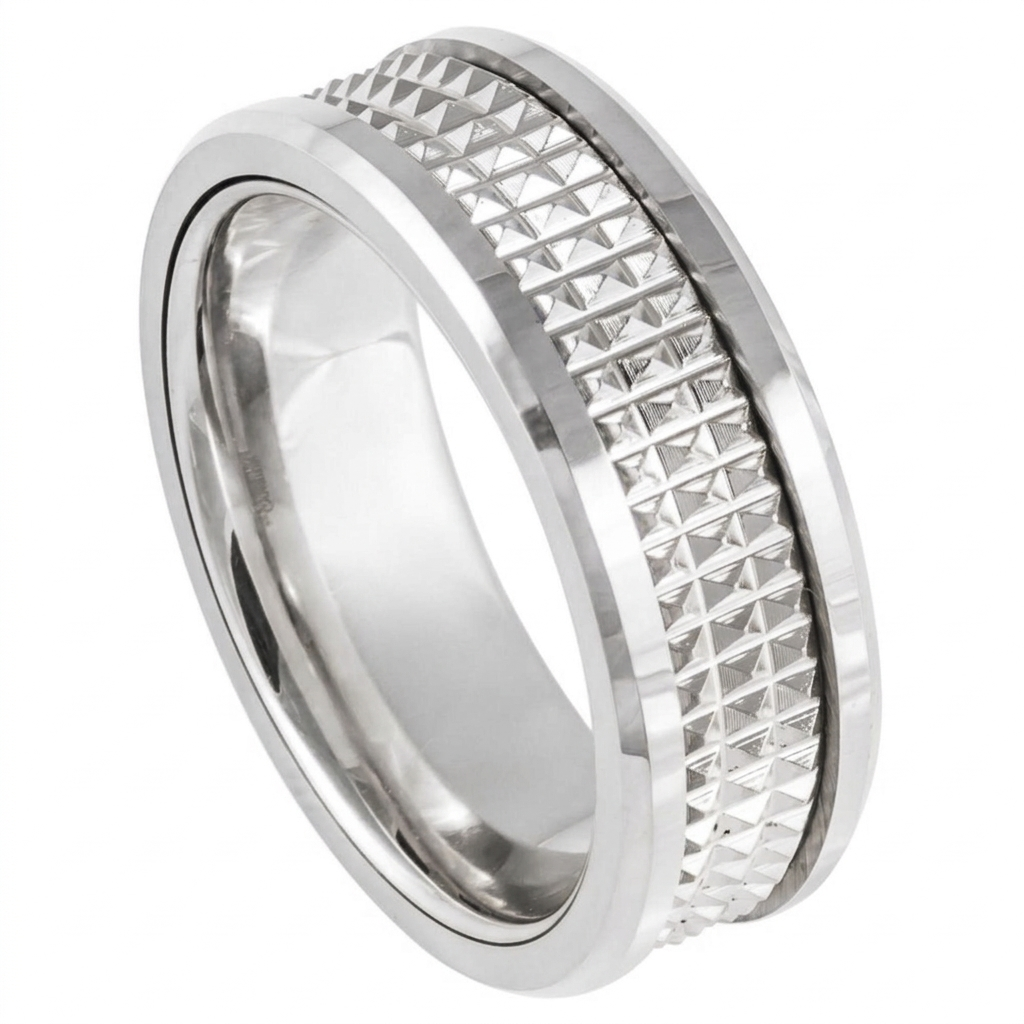 Studio side profile shot of a men's white gold pyramid stud textured wedding ring with polished beveled edges