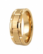 Side angle studio shot of a men's yellow gold ring with grooved brick pattern and comfort fit interior
