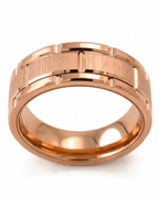 Front studio shot of a men's rose gold wedding band showing a brushed center and notched outer trim