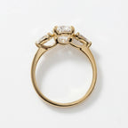 Straight-on profile view showing the secure basket setting and polished band of a 4 carat oval lab diamond ring.