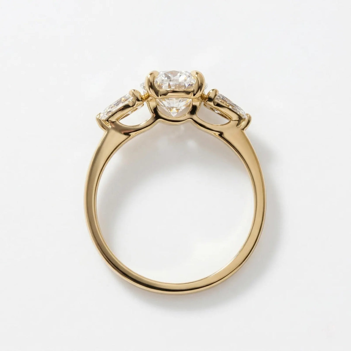 Straight-on profile view showing the secure basket setting and polished band of a 4 carat oval lab diamond ring.