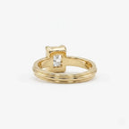 Rear perspective view showing the interior band design and open basket gallery under a 3 CT radiant cut lab diamond.