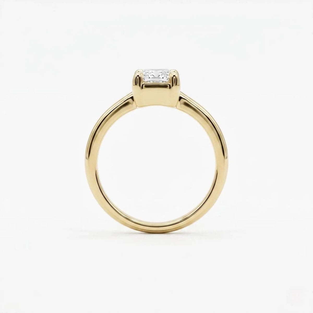 Side profile view showing the low-profile basket setting and circle silhouette of a 3 CT radiant cut lab grown diamond ring.