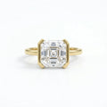 Face-up view showing the step-cut facets of a 3 carat Asscher cut lab grown diamond in yellow gold.