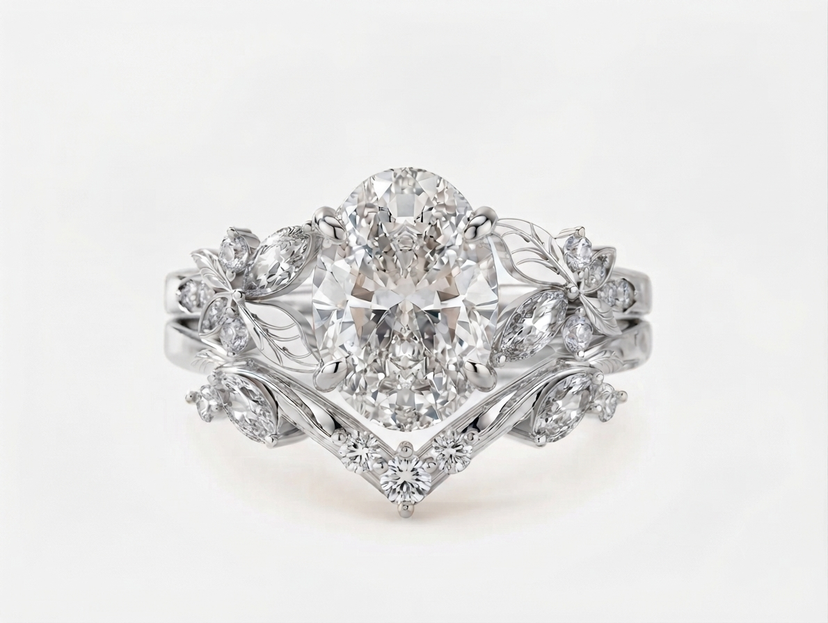Front top view of a 3 carat oval cut lab grown diamond bridal ring stack crafted in solid 14k white gold.