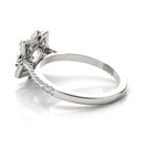 Side profile showing the comfortable smooth inner band and intricate gallery setting under the center stone.