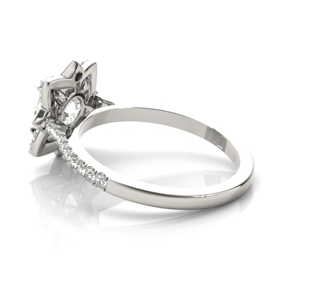 Side profile showing the comfortable smooth inner band and intricate gallery setting under the center stone.