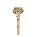 Top profile angle of a yellow gold vintage round lab diamond ring showing the pave shoulder band and halo elevation.