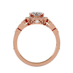 Full side view of a 3 carat round lab grown diamond halo ring in rose gold showing side filigree detail and accent stone.